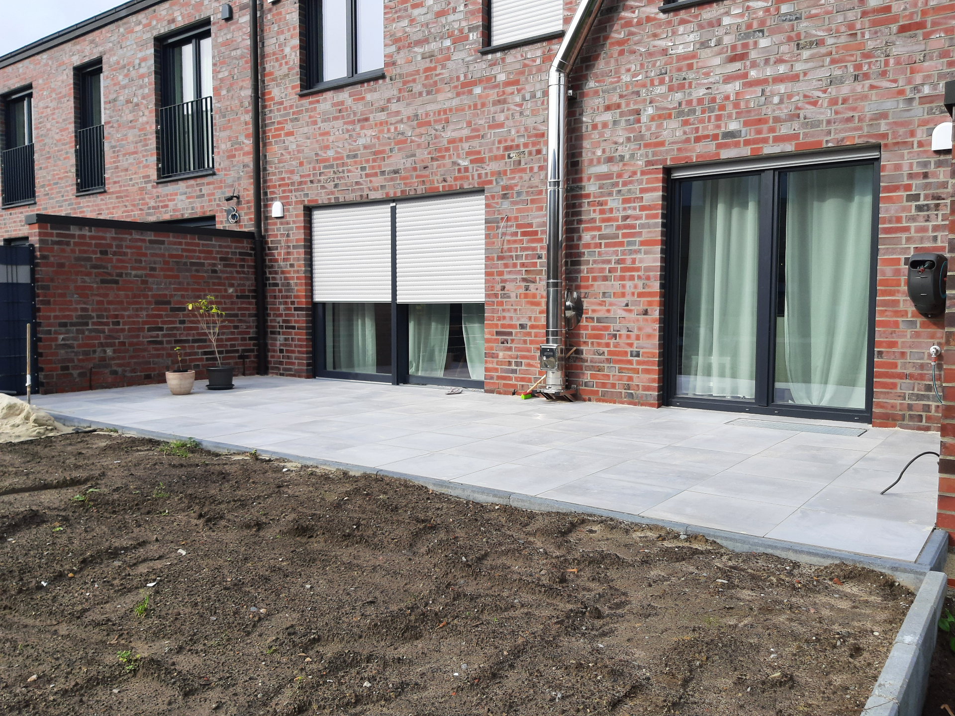 Terrasse aus Keramikplatten in Ahaus nach der Fertigstellung